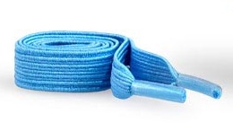 A pair of coiled bright blue shoelaces with plastic tips on a white background.