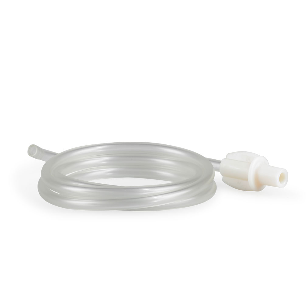 Clear coiled medical tubing with a white plastic connector on one end, placed on a white background.