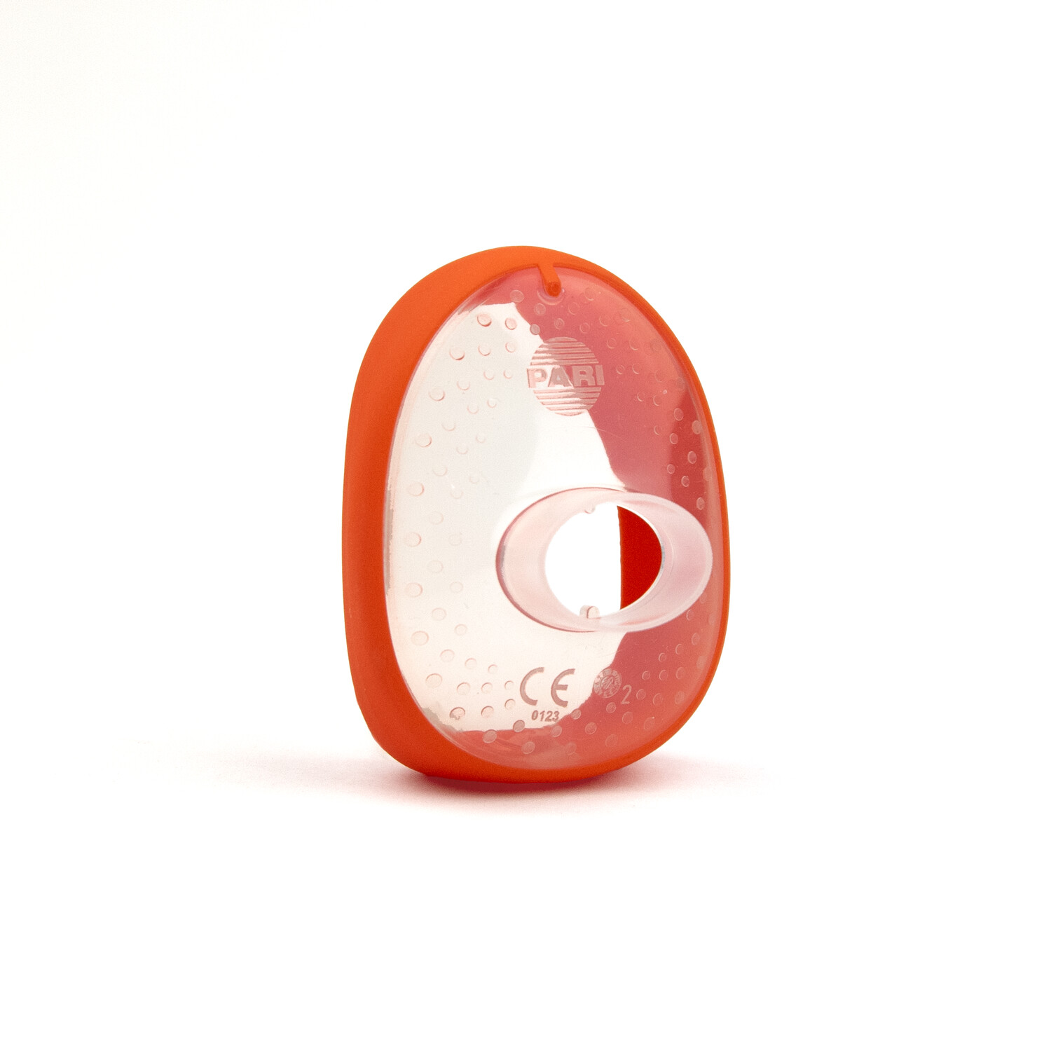 Transparent plastic mask with an orange rim, oval-shaped, standing upright on a white background.