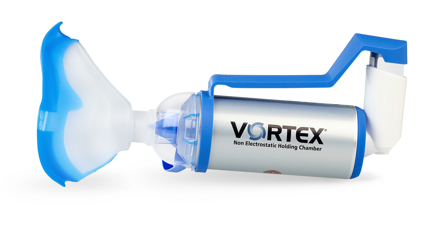 A Vortex non-electrostatic holding chamber with a blue face mask and inhaler attachment.