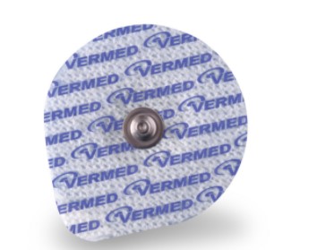 Round medical electrode pad with "VERMED" text printed in blue and a metal snap connector in the center.