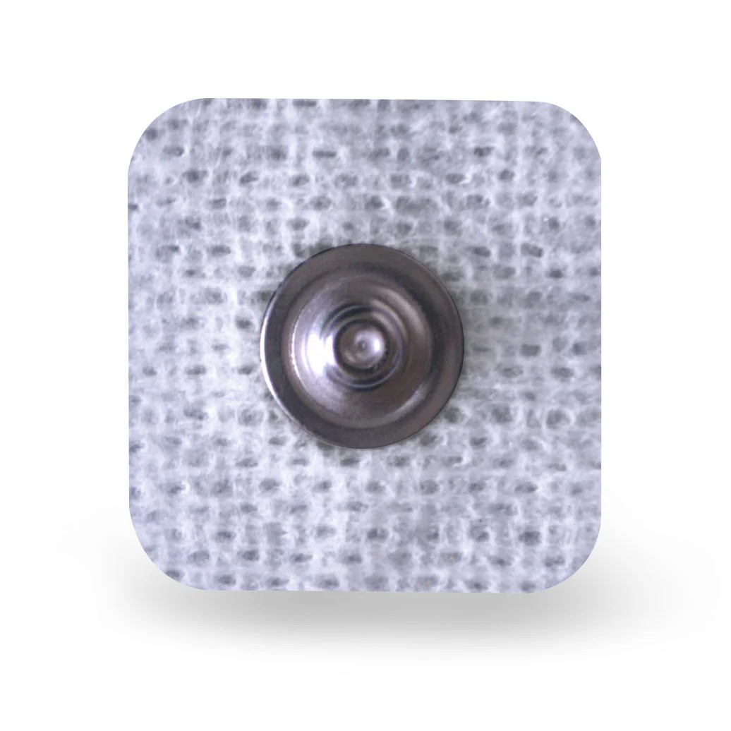 A square medical electrode pad with a metallic snap connector in the center.