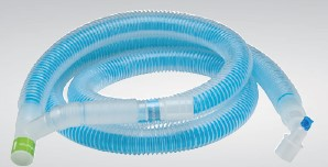 Blue corrugated plastic medical breathing hose with connectors on each end, coiled on a plain background.