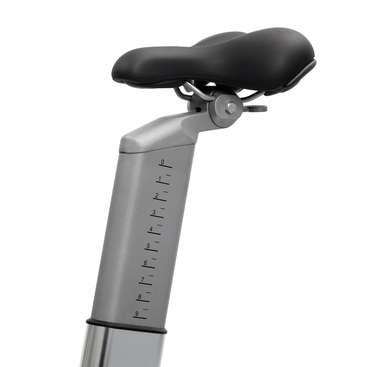 Close-up of a black bicycle seat attached to a silver adjustable seat post with measurement markings.