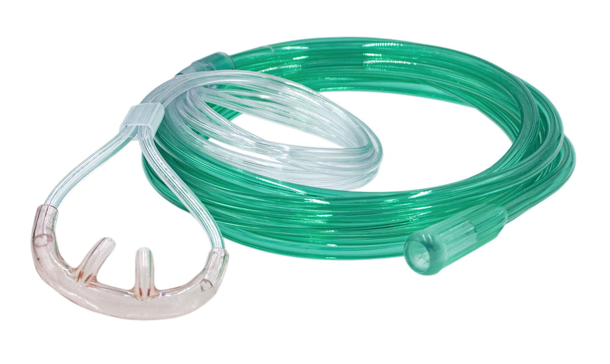 A coiled green and clear oxygen nasal cannula with prongs and tubing on a white background.